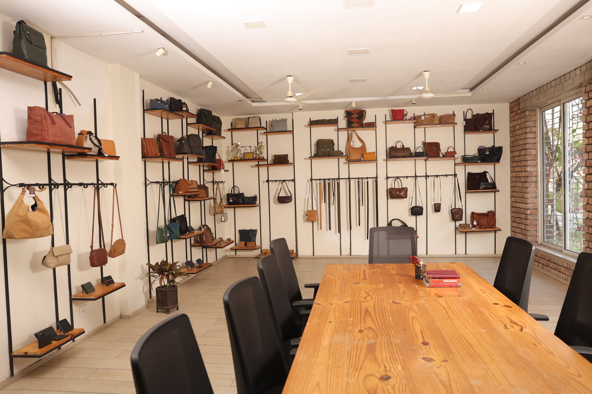 Skilled artisan handcrafting leather edges in Kolkata workshop